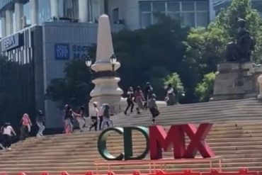 Colectivo feminista protesta en Reforma durante Show Run de 'Checo' Pérez